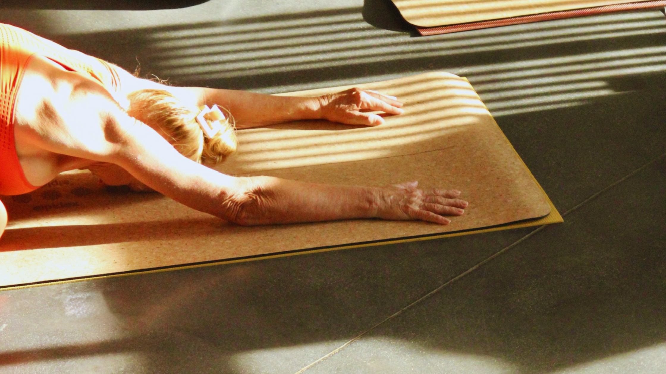 A relaxing restorative yoga class in child’s pose